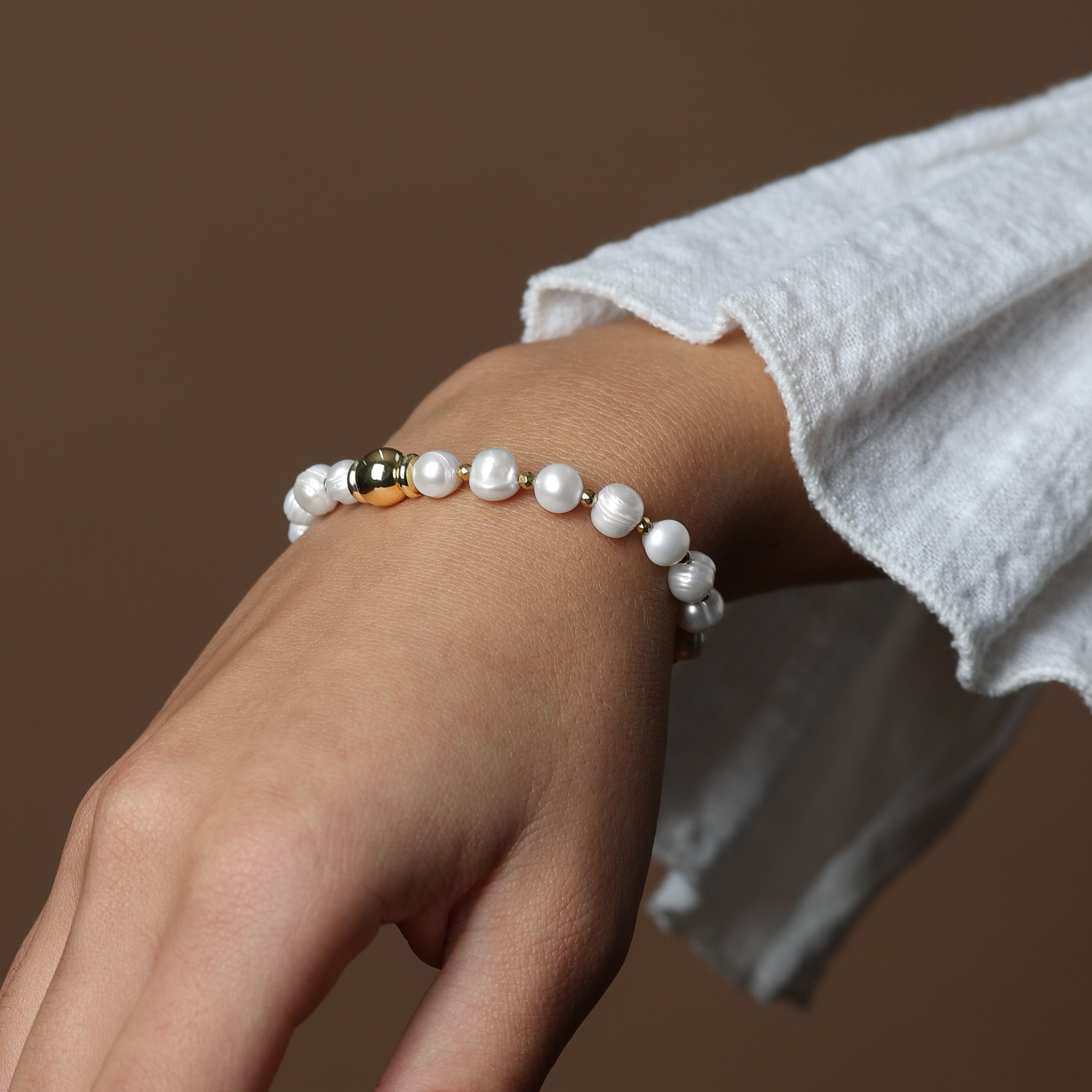 PEARL BRACELET - FEATURING MIDDLE GOLD FILLED SPHERE