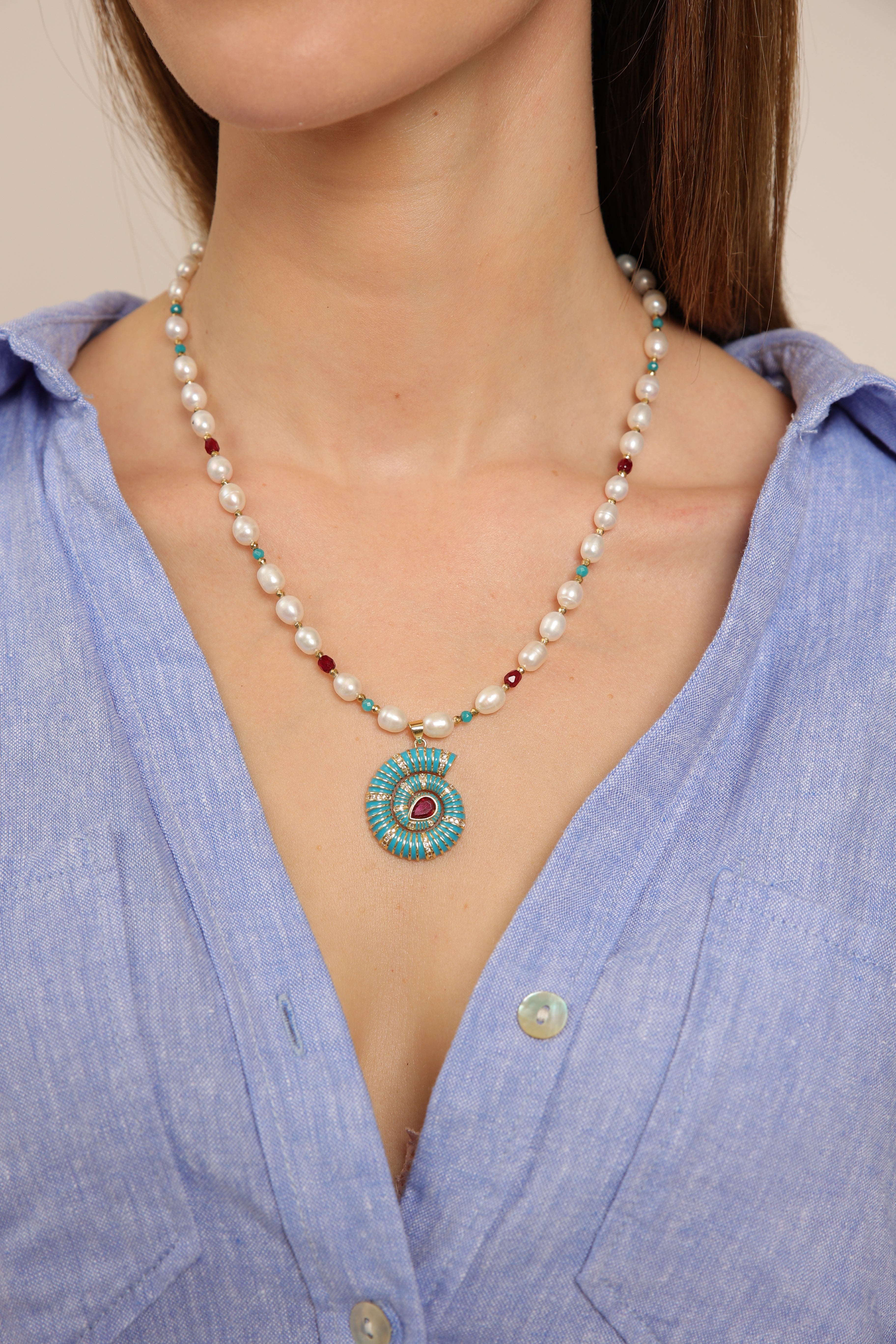 Pearl Necklace with Nautilus Shell Pendant