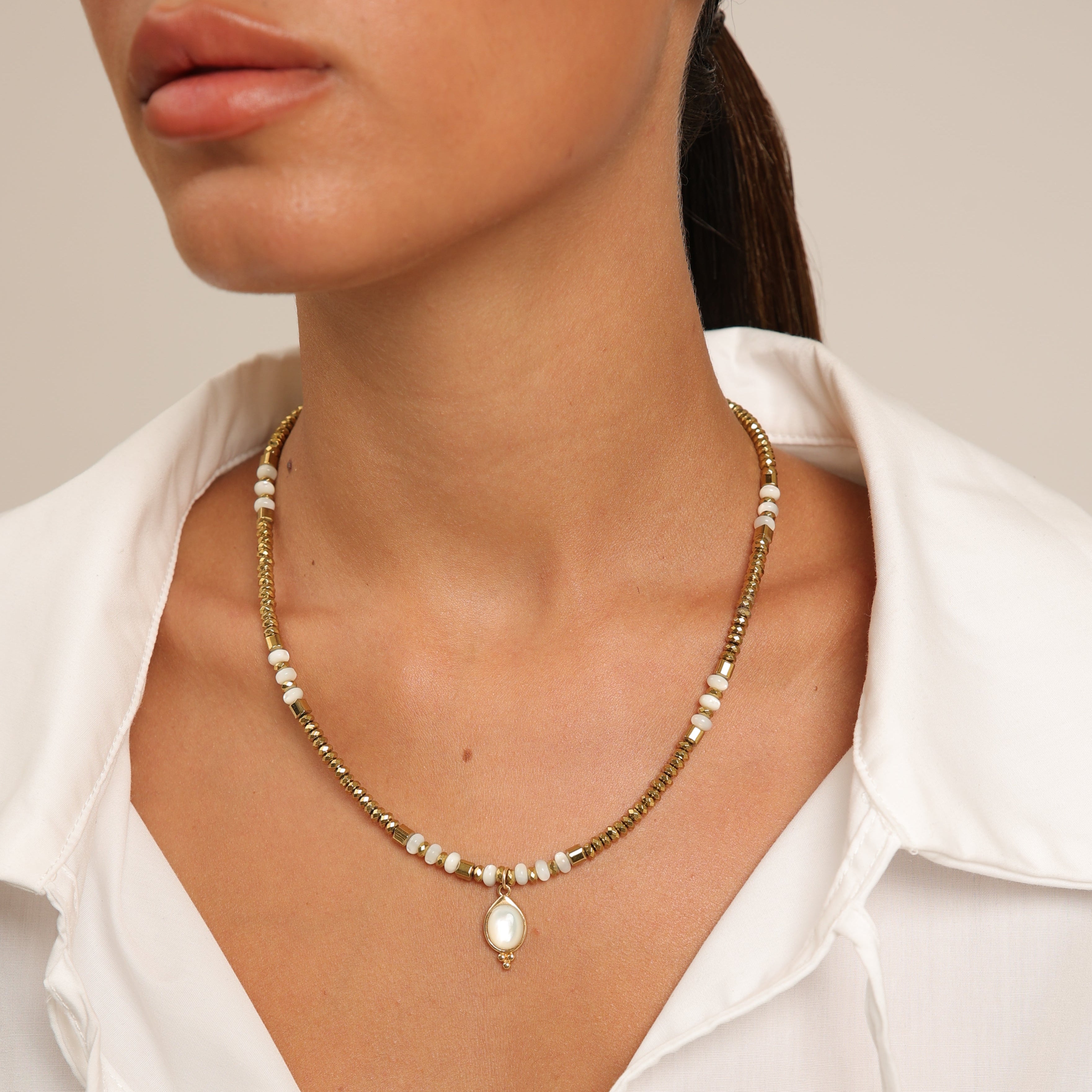 Hematite Necklace with Mother of Pearl Gold Pendant